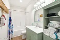 225 NE 54th Street, Oak Island, NC 28465 — 3-bedroom home, Oak Island, NC, photo 23 of 73: shniderproductions.com-41