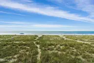 491 Ocean Boulevard W, Holden Beach, NC 28462 — 4-bedroom waterfront home in Holden Beach, Holden Beach, NC, photo 5 of 47: 491 Ocean Blvd W