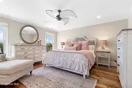 223 Sound Side Drive, Atlantic Beach, NC 28512 — 4-bedroom waterfront home in Bay Ridge, Atlantic Beach, NC, photo 15 of 57: Primary suite