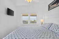 6011 W Beach Drive, Oak Island, NC 28465 — 4-bedroom waterfront home in Long Beach, Oak Island, NC, photo 20 of 68