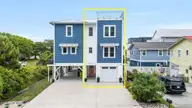 304 Birmingham Avenue Unit 1, Carolina Beach, NC 28428 — 4-bedroom townhome, Carolina Beach, NC, photo 2 of 73: 69_DJI_20260427121028_0570_D copy