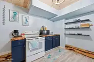 141 Pender Lane, Newport, NC 28570 — 3-bedroom manufactured home, Newport, NC, photo 24 of 36: Downstairs Studio - Kitchen2
