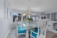 301 Salter Path Road 12 Genesis, Pine Knoll Shores, NC 28512 — 3-bedroom waterfront condo in Genesis, Pine Knoll Shores, NC, photo 19 of 48: Dining Room