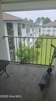 456 Racine Drive Unit D304, Wilmington, NC 28403 — 2-bedroom condo in Campus Edge, Wilmington, NC, photo 3 of 13: Balconies