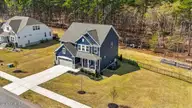 980 W Hedgelawn Way, Southern Pines, NC 28387 — 4-bedroom home in Sandhurst South, Southern Pines, NC, photo 2 of 59: 17-dji_fly_20260326_123042_0727_17745724
