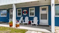 207 E Terminal Boulevard, Atlantic Beach, NC 28512 — 4-bedroom waterfront home, Atlantic Beach, NC, photo 3 of 68: Front Porch View
