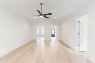 4930 N Hampton Drive SE, Southport, NC 28461 — 3-bedroom waterfront home in Carolina Place, Southport, NC, photo 19 of 58: Living room