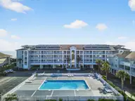 27 Ocean Isle West Boulevard # 1h, Ocean Isle Beach, NC 28469 — 2-bedroom waterfront condo in Windjammer OIB, Ocean Isle Beach, NC, photo 1 of 66: 01-kahunaphoto
