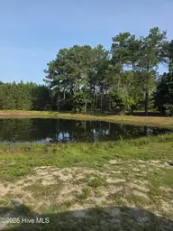 1062 71 Tinton Point SW, Sunset Beach, NC 28468 — waterfront lot in Ocean Ridge Plantation, Sunset Beach, NC, photo 1 of 6