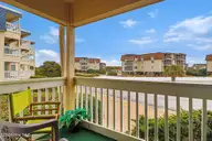 1904 E Fort Macon Road 156, Atlantic Beach, NC 28512 — 2-bedroom waterfront condo in APATB, Atlantic Beach, NC, photo 3 of 54: Covered Balcony