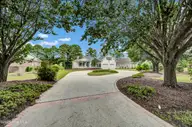 1806 Urchin Lane SE, Bolivia, NC 28422 — 3-bedroom waterfront home in Winding River Plantation, Bolivia, NC, photo 2 of 61: 002_img_1929_359