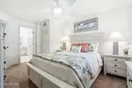 908 Resort Circle Unit 906, Sunset Beach, NC 28468 — 1-bedroom condo in Colony II, Sunset Beach, NC, photo 16 of 35: Main bedroom