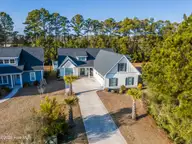 179 Twining Rose Lane, Holly Ridge, NC 28445 — 4-bedroom home in Summerhouse On Everett Bay, Holly Ridge, NC, photo 4 of 61: DJI_20260209155159_0068_D