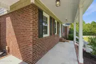 238 Shannon Drive, Wilmington, NC 28409 — 3-bedroom waterfront home in Shalamoor, Wilmington, NC, photo 6 of 75: 6_front porch