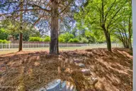 1235 Burning Tree Road 12, Pinehurst, NC 28374 — 3-bedroom home in Unit 12, Pinehurst, NC, photo 20 of 24: Backyard