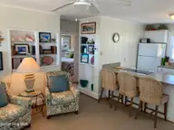 122 Ocean Boulevard E, Holden Beach, NC 28462 — 3-bedroom waterfront home, Holden Beach, NC, photo 12 of 39: HB Living room 4
