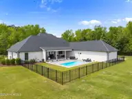 47 E Rolling Meadows Road, Hampstead, NC 28443 — 4-bedroom home in Whitebridge, Hampstead, NC, photo 8 of 72: 26-web-or-mls-DJI_20260413125550_0693_D