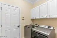 140 Shadow Creek Court, Pinehurst, NC 28374 — 2-bedroom townhome in Villas at Forest Hills, Pinehurst, NC, photo 15 of 39: Laundry Room