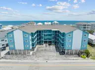 1404 Canal Drive Apt 11, Carolina Beach, NC 28428 — 2-bedroom condo in Ocean Harbor, Carolina Beach, NC, photo 1 of 48: Building Exterior View