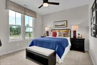 1218 Sunwater Terrace, Leland, NC 28451 — 4-bedroom townhome in Grand Park, Leland, NC, photo 23 of 49: Bedroom - Hyacinth BE - Grand Park