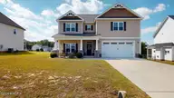 103 Aspen Ridge Drive, Pikeville, NC 27863 — 4-bedroom home in Stonebridge, Pikeville, NC, photo 1 of 46: Main