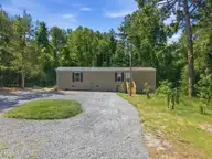 485 Spring Lake Road, Pinehurst, NC 28374 — 2-bedroom manufactured home, Pinehurst, NC, photo 4 of 36: 1-web-or-mls-DJI_20260818114220_0553_D -