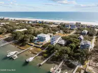 452 N Anderson Boulevard, Holly Ridge, NC 28445 — 3-bedroom waterfront home, Holly Ridge, NC, photo 1 of 4: 6-web-or-mls-DJI_20241213114252_0757_D (