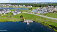 537 Moss Lake Lane, Holly Ridge, NC 28445 — 3-bedroom home in Summerhouse On Everett Bay, Holly Ridge, NC, photo 5 of 72: 70_dji_20240815174428_0052_d
