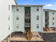 918 N New River Drive 314, Surf City, NC 28445 — 1-bedroom waterfront condo in Surf Condominiums, Surf City, NC, photo 1 of 25