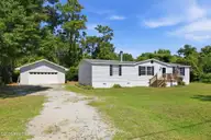 122 Lejeune Road, Cape Carteret, NC 28584 — 3-bedroom home in Bayshore Park, Cape Carteret, NC, photo 1 of 43: Front