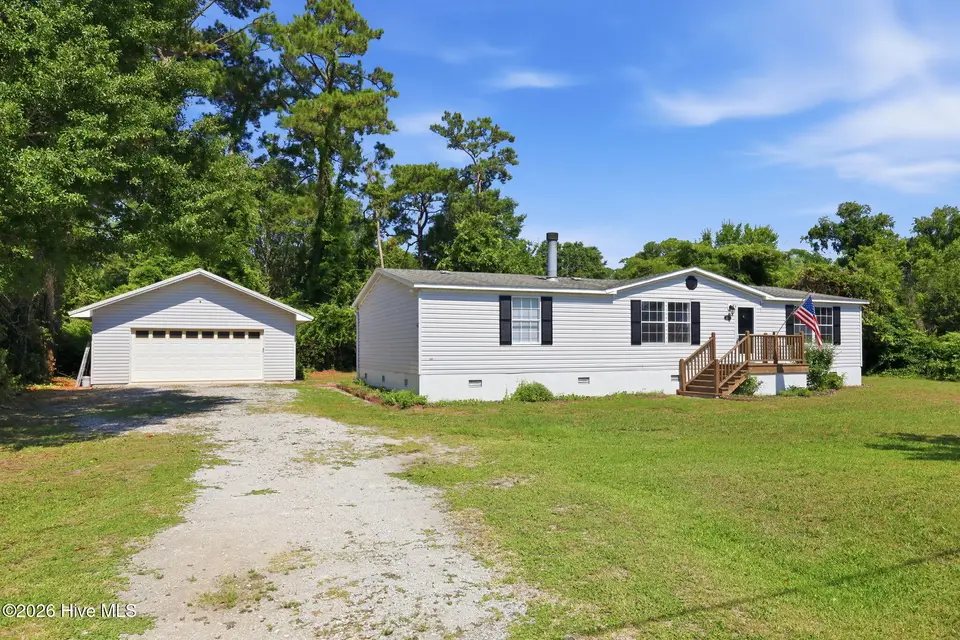 122 Lejeune Road, Cape Carteret, NC 28584 — 3-bedroom home in Bayshore Park, Cape Carteret, NC, photo 1 of 43: Front