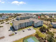 10300 Coast Guard Road 107-E, Emerald Isle, NC 28594 — 3-bedroom condo in Point Emerald Villas, Emerald Isle, NC, photo 1 of 51: 4-web-or-mls-DJI_20260402133614_0233_D