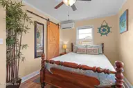 221 Bayview Drive, Harkers Island, NC 28531 — 2-bedroom waterfront home in Earl Davis, Harkers Island, NC, photo 23 of 53: Bedroom 2