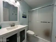 10172 Beach Drive SW Unit 2106, Calabash, NC 28467 — 2-bedroom condo in Carolina Shores Reso, Calabash, NC, photo 18 of 35: Primary Ensuite Bathroom