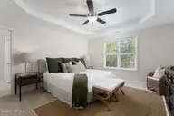 59 S Bandwheel Way, Hampstead, NC 28443 — 4-bedroom home in Sawyers Run, Hampstead, NC, photo 13 of 30: Primary Bedroom