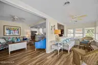 510 W Bogue Boulevard, Atlantic Beach, NC 28512 — 3-bedroom home, Atlantic Beach, NC, photo 5 of 55: sunporch entry to living room