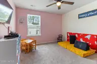 26 Fresh Air Drive, Hampstead, NC 28443 — 4-bedroom home in Hope Creek, Hampstead, NC, photo 17 of 39: Bedroom