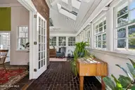 156 Candlewood Road, Rocky Mount, NC 27804 — 4-bedroom home in Candlewood, Rocky Mount, NC, photo 21 of 68: Sunroom 2