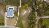 15 Shipyard Lane, Hampstead, NC 28443 — waterfront lot in Sloop Point Plantation, Hampstead, NC, photo 3 of 5: DJI_0307