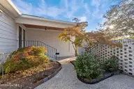 1600 Chip Shot Drive, Morehead City, NC 28557 — 3-bedroom home in Country Club East, Morehead City, NC, photo 3 of 57: courtyard front entrance
