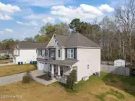 704 Oleander Street, Jacksonville, NC 28540 — 4-bedroom home in Williamsburg Plantation, Jacksonville, NC, photo 2 of 53: 2-web-or-mls-704 Oleander St. 98