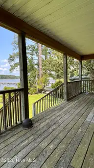 201 Barnes-Foster Loop Road, Belhaven, NC 27810 — 2-bedroom waterfront home, Belhaven, NC, photo 2 of 9: Back porch