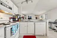 1530 Salter Path Road 15, Indian Beach, NC 28512 — 2-bedroom waterfront manufactured home in Tradewinds, Indian Beach, NC, photo 8 of 32: Kitchen