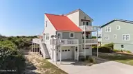 425 Caswell Beach Road, Caswell Beach, NC 28465 — 3-bedroom waterfront home in Caswell Beach, Caswell Beach, NC, photo 3 of 73: 3_DJI_20261014231412_0061_D copy