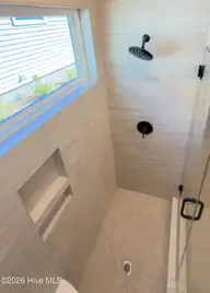 161 Twining Rose Lane, Holly Ridge, NC 28445 — 3-bedroom home in Summerhouse On Everett Bay, Holly Ridge, NC, photo 18 of 62: primary shower