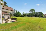 1200 Caracara Drive, New Bern, NC 28560 — 3-bedroom home in Fairfield Harbour, New Bern, NC, photo 23 of 31: Covered Patio