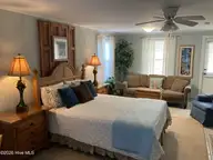 122 Ocean Boulevard E, Holden Beach, NC 28462 — 3-bedroom waterfront home, Holden Beach, NC, photo 15 of 39: Beach downstairs