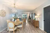 505 N Carolina Beach Avenue Unit 1c, Carolina Beach, NC 28428 — 2-bedroom waterfront condo in Winds at Carolina Beach, Carolina Beach, NC, photo 6 of 44: Dining Room 3