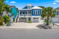 114 Heather Lane, Kure Beach, NC 28449 — 3-bedroom waterfront home in Kure Estates, Kure Beach, NC, photo 2 of 61: Front of Home
