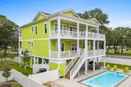 96 SE 66th Street, Oak Island, NC 28465 — 8-bedroom home, Oak Island, NC, photo 1 of 39